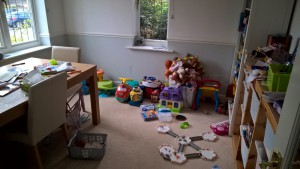 Before - muddled playroom and dining room