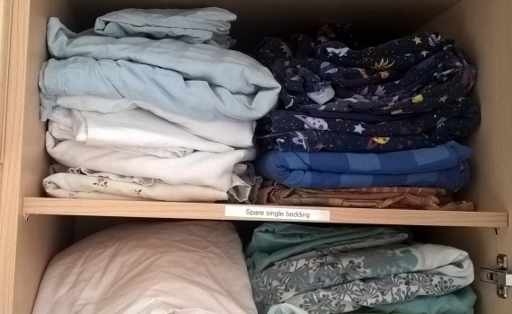 Decluttered laundry cupboard